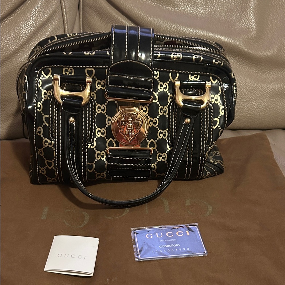 Gucci Black and Gold Satchel